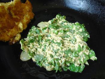 Pomtajer latkes in the pan