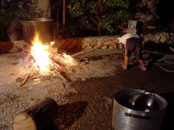 Saosan making carob syrup in Ayn Hawd, Debra Solomon, culiblog.org