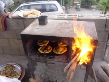 Hannan makes bread, or pita za'atar, or mankoushe, Debra Solomon, culiblog.org