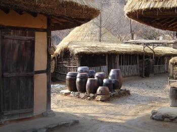 Kimchi pots stored in the centre of a folk village, from Save the Dinosaur's photostream on Flickr, Debra Solomon, culiblog.org