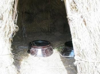 Kimchi pots buried in straw, from Makigama's photostream on Flickr, Debra Solomon, culiblog.org