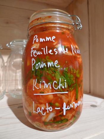 Pot of apple and turnip kimchi demonstrating lacto-fermentation at the City Eco Lab as part of the Int'l BiÃ«nale du Design in St. Etienne. Debra Solomon, culiblog.org